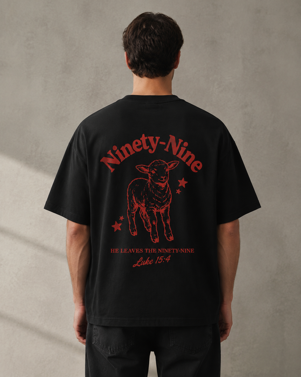 The Ninety-Nine oversized Christian T-shirt on model, Black back view