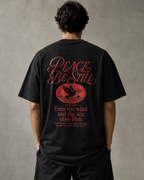 Peace Be Still oversized Christian T-shirt on model, Black back view