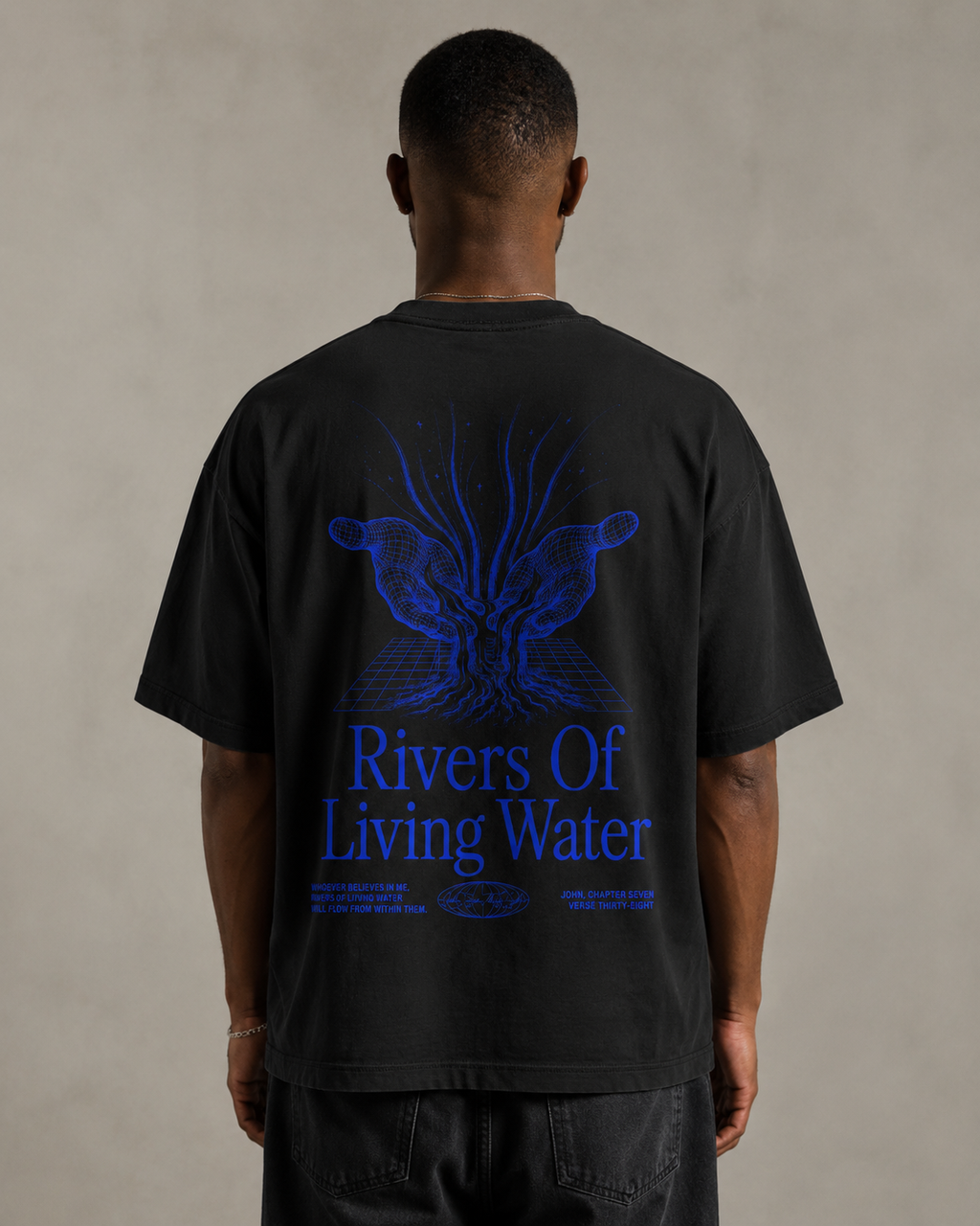 Rivers Of Living Water oversized Christian T-shirt on model, Black back view
