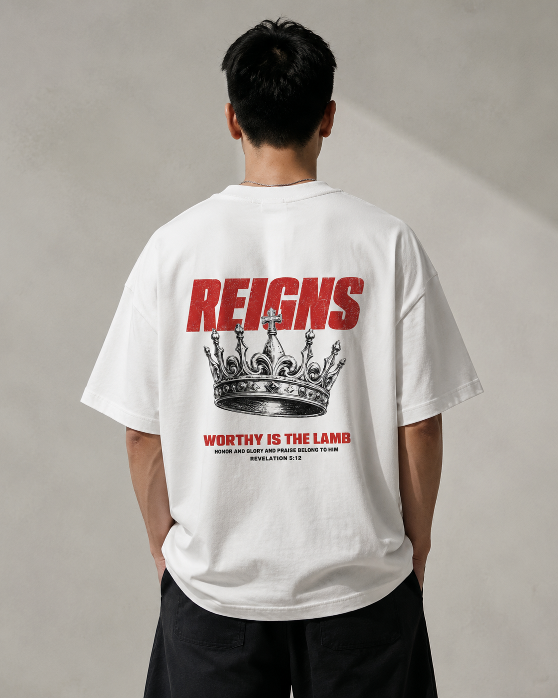 Worthy Is The Lamb oversized Christian T-shirt on model, White back view