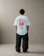 N&K editorial mockup v2 | peace-be-still-oversized-tee | sky-blue | back